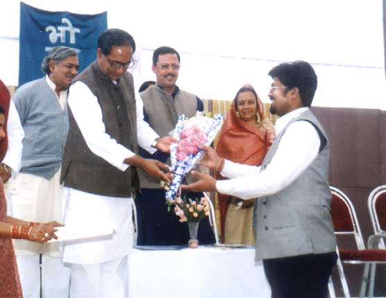 Chief Minister of MP Felicitating Sunil Choudhary 